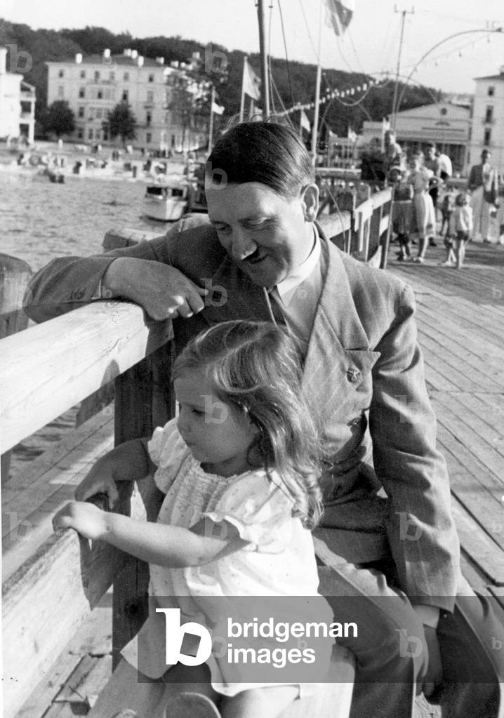 Adolf Hitler with Helga Goebbels, 1935 (b/w photo)