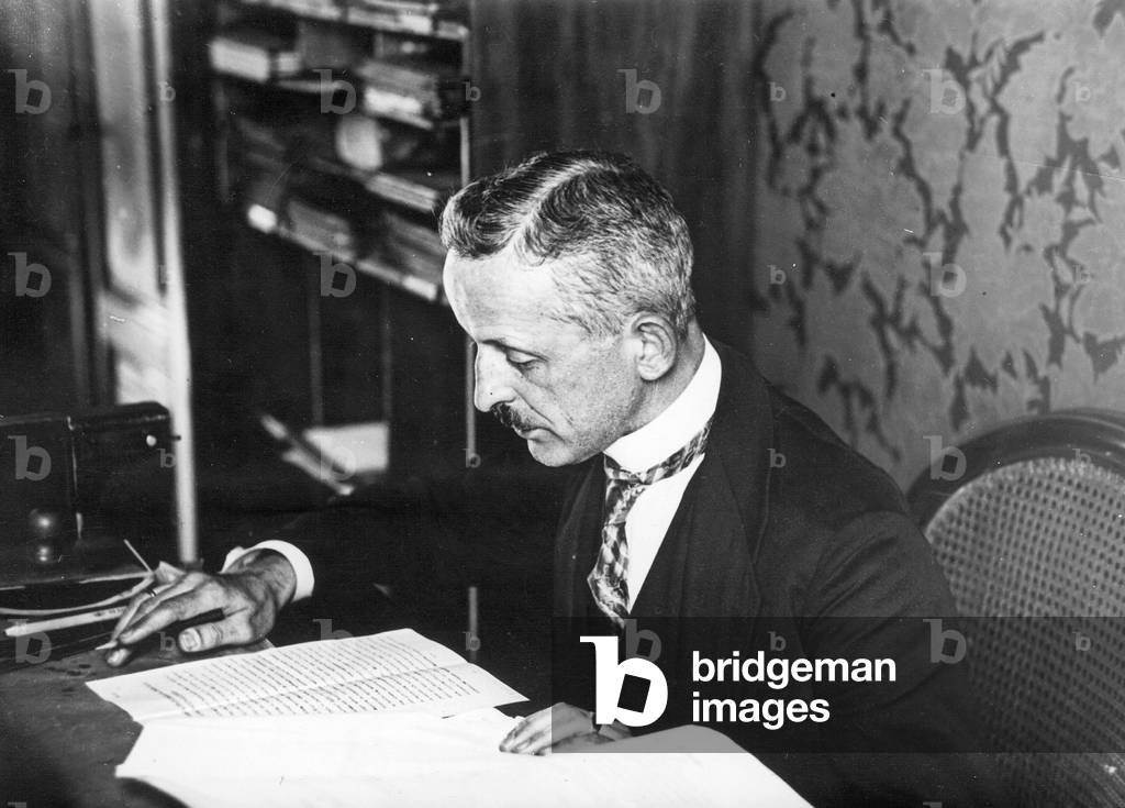 Official in his office, 1920 (b/w photo)