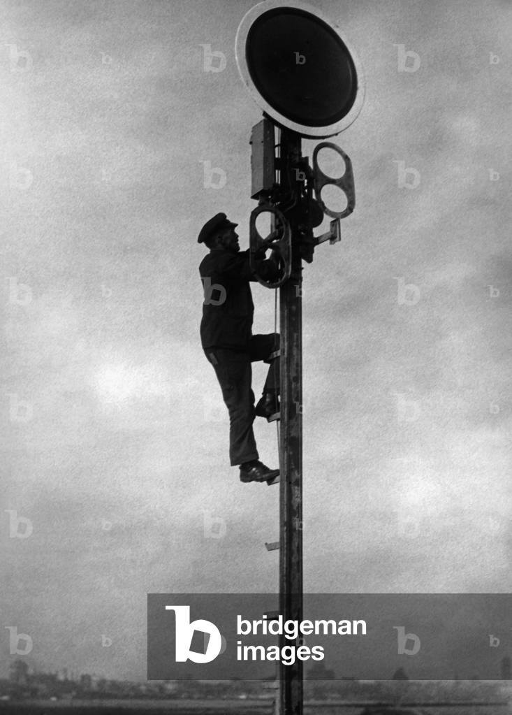 Mounting a railroad signal in Germany, 1936 (b/w photo)