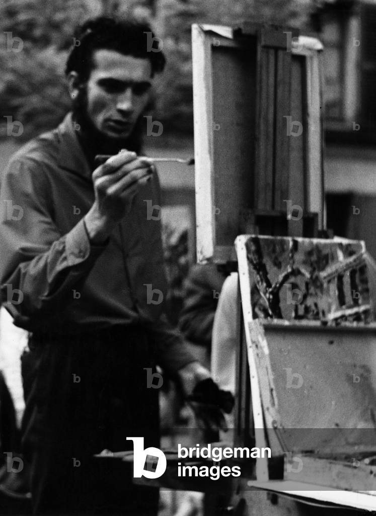 A street artist at the 'Place du Tertre', 1960 (b/w photo)