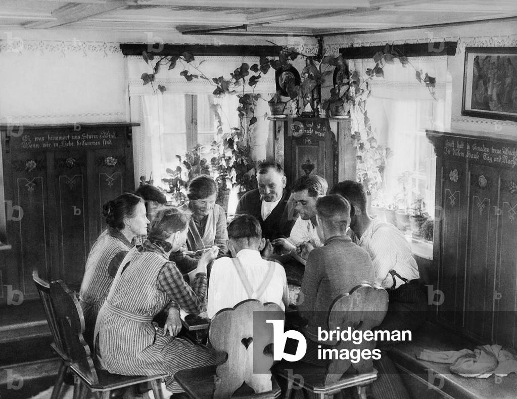 Farming family eating lunch, 1936 (b/w photo)