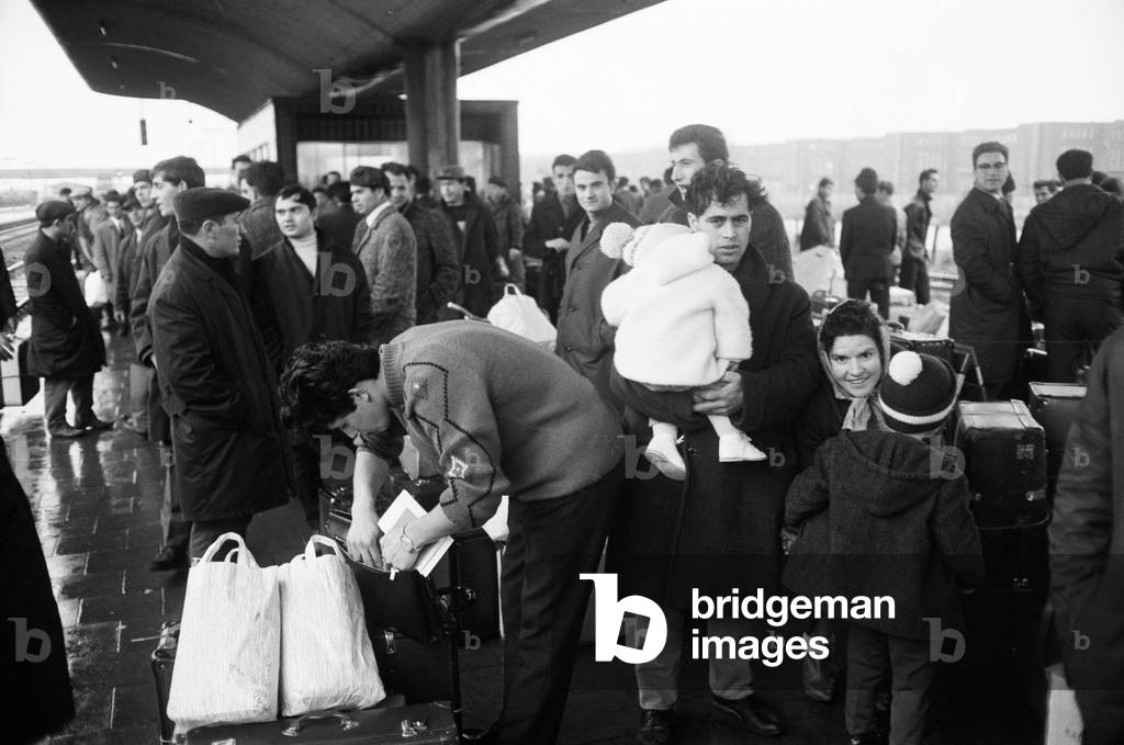 Some compartments are reserved for families with children during the 20 hour journey. (b/w photo)