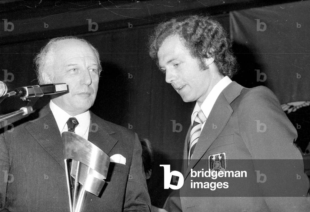 Walter Scheel and Franz Beckenbauer at the celebration of the World Cup victory in Munich, 1974 (b/w photo)