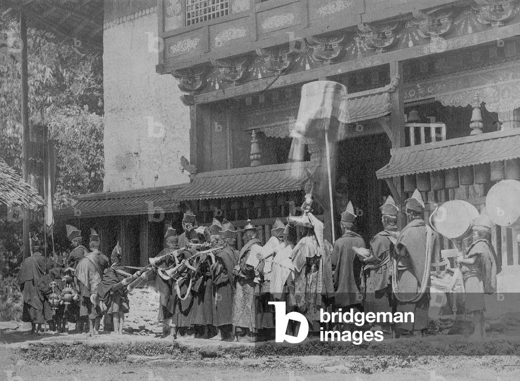 Procession of lamas in front of the Phadong monastery (b/w photo)