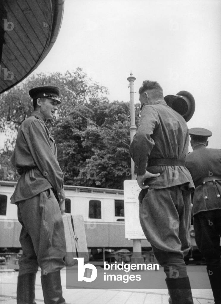 Soviet soldiers at a train station in the occupied Austria, 1950s (b/w photo)