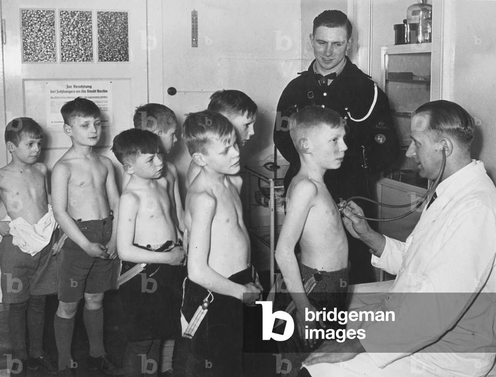 Medical examination for the admission to Deutsches Jungvolk, 1927 (b/w photo)