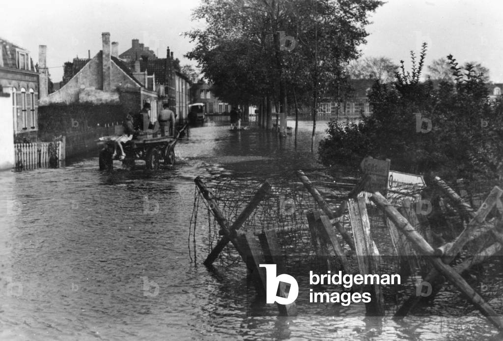 By English bombers destroyed dams flood the city Middelburg, 1944 (b/w photo)