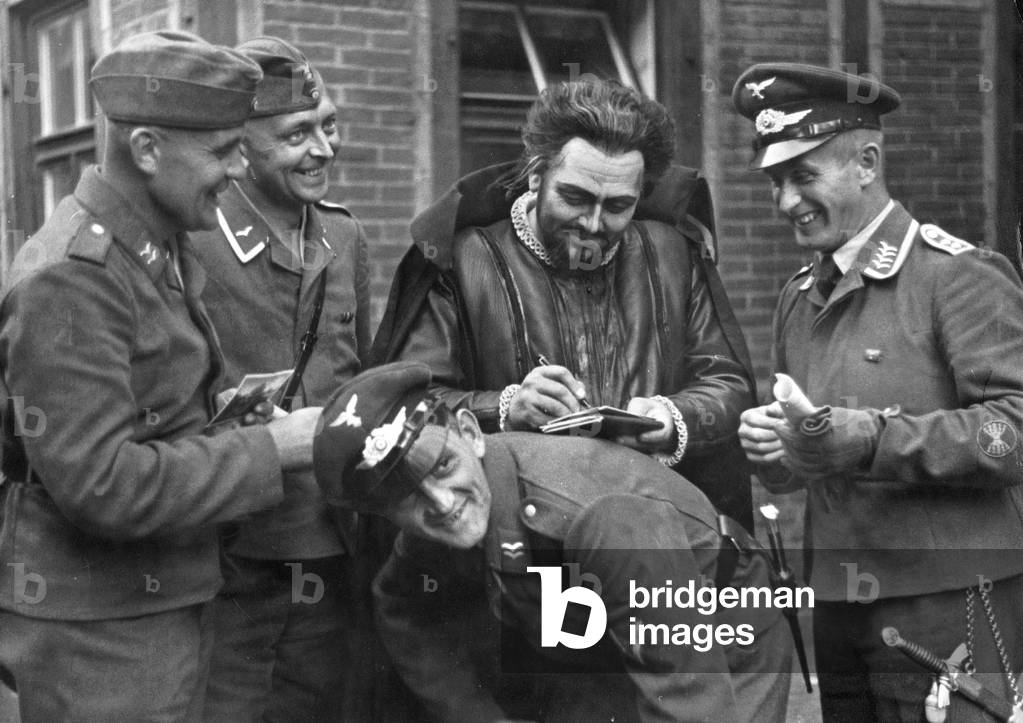 Jaro Prohaska gives autographs, 1940 (b/w photo)
