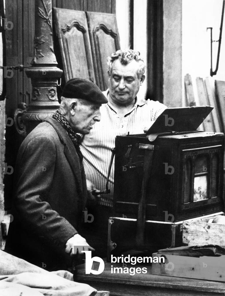 A flea market in Paris, 1959 (b/w photo)