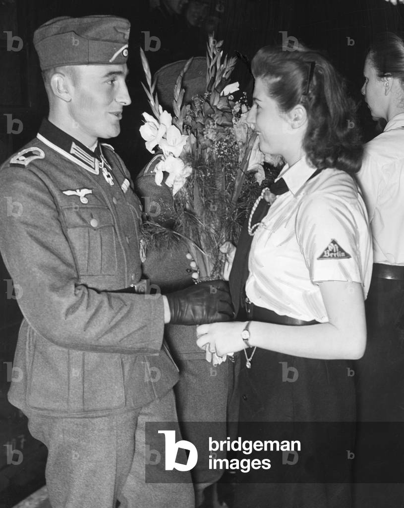 BDM (League of German Girls) girl with soldiers in Berlin, 1942