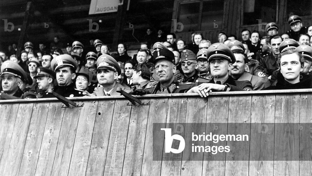 Rudolf Hess in the ice rink during the game Sudetenland against Cologne-Aachen, 1941 (b/w photo)