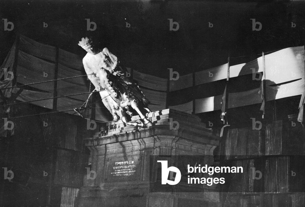 The equestrian statue of Menelik II is removed in Ethiopia, 1937 (b/w photo)