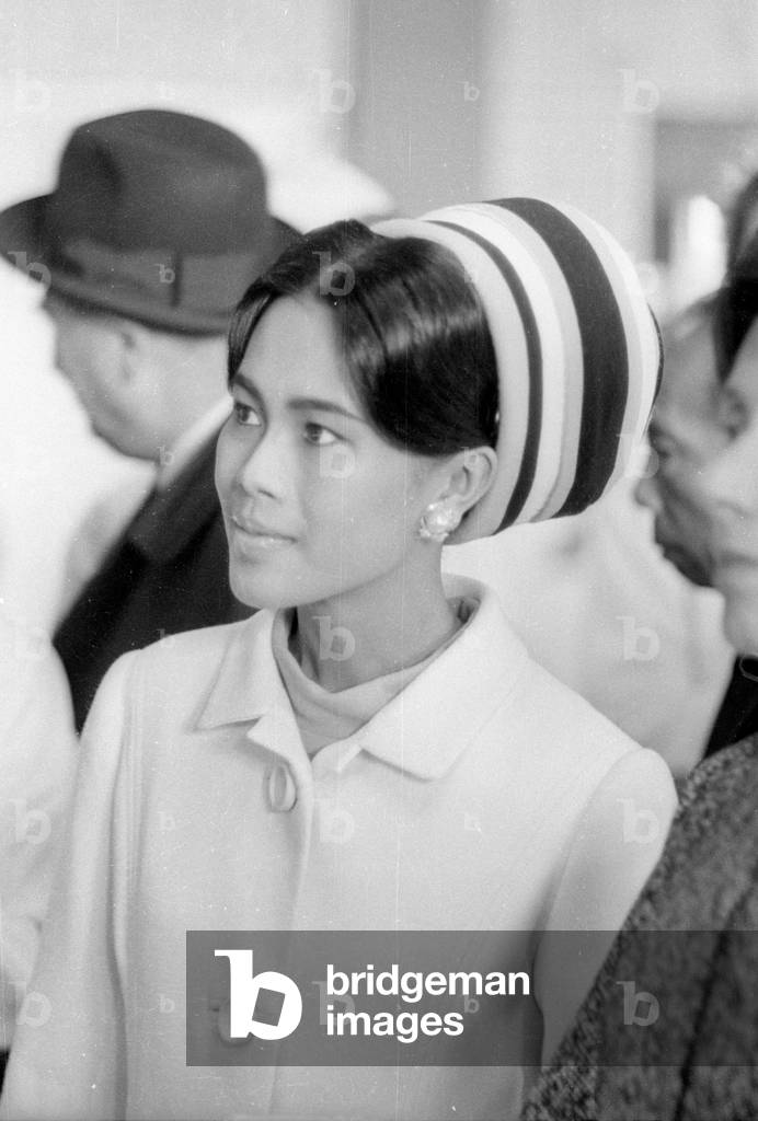 The Thai royal couple in a fish factory in Bremen, 1966 (b/w photo)