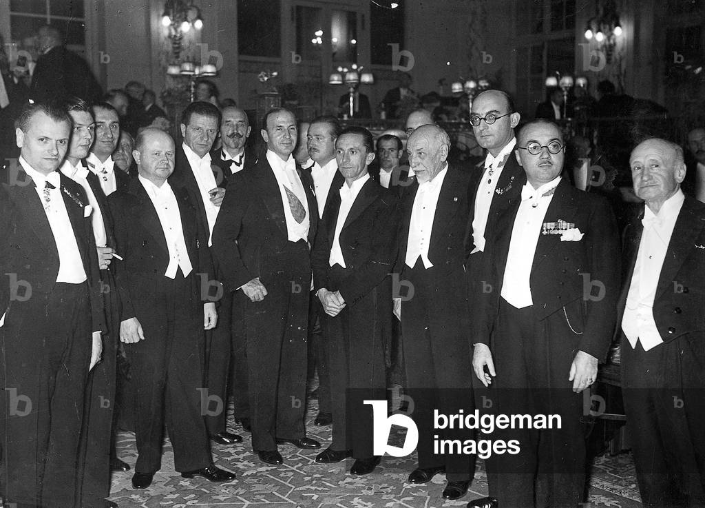 Goebbels with artists at the 9th Congress of Composers and Authors (b/w photo)