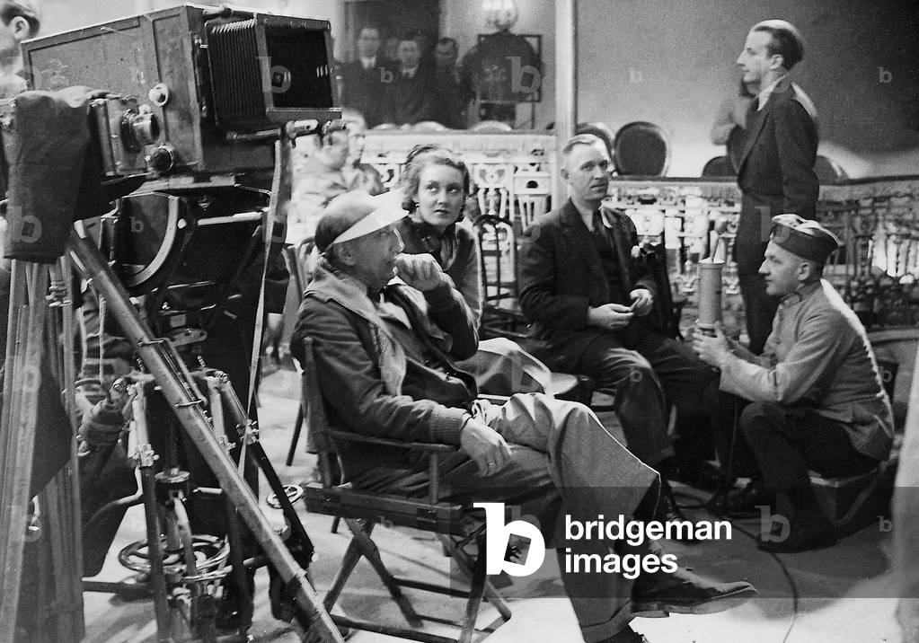 Karl Ritter and Lida Baarova at the shooting of the 'Patriots', 1937 (b/w photo)