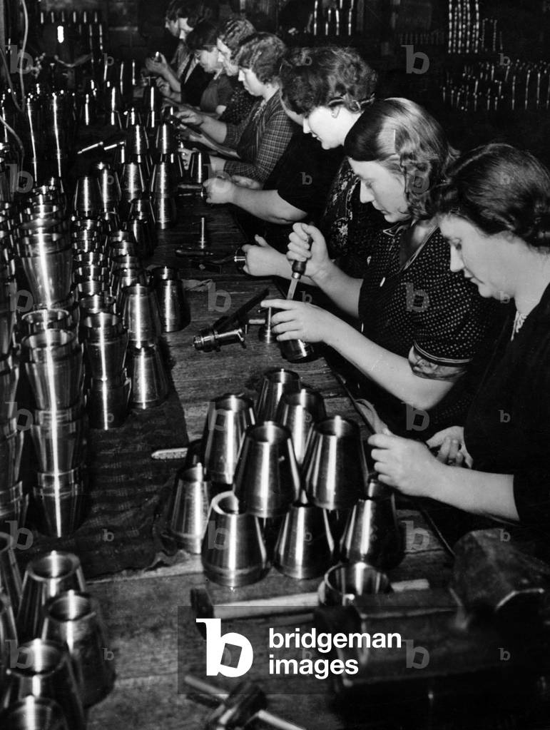 Women in the arms industry, munitions factory, 1940 (b/w photo)