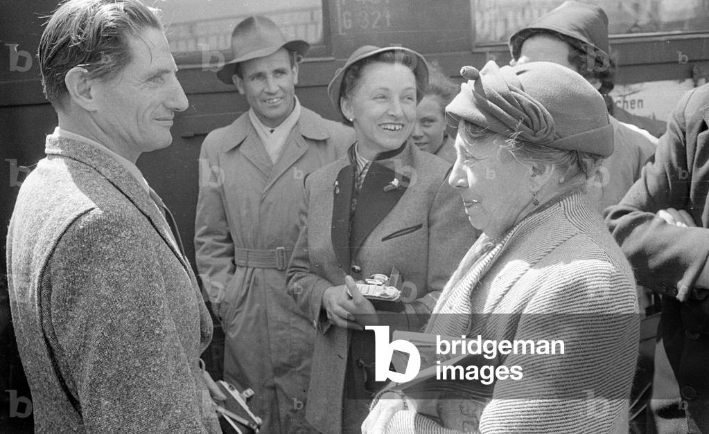 Taking leave of the members of the German Himalayan Expedition in Munich, 1954 (b/w photo)