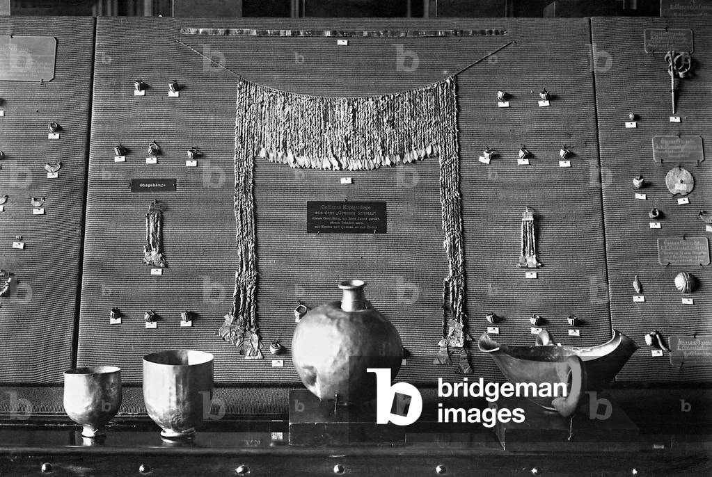 The 'Treasure of Priam', found by Heinrich Schliemann in 1873 during the excavations at Troy, exhibited in the Berlin Museum of Ethnology, 1922 (b/w photo)