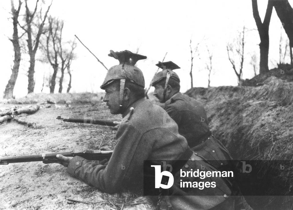 German Uhlans defending a trench on the Western Front during WWI, 1914 (b/w photo)