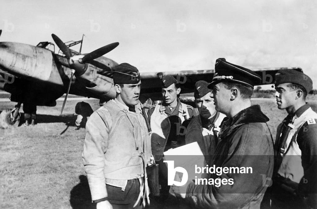 German pilots discuss their mission, 1940 (b/w photo)