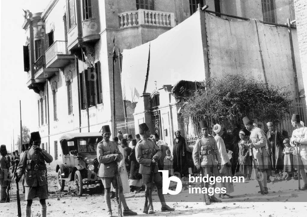 Soldiers guard the house of an Egyptian Member of Parliament, 1928 (b/w photo)