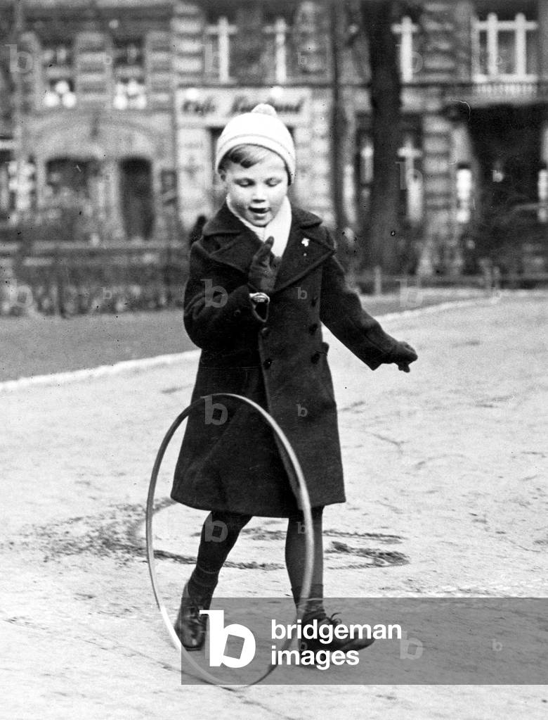 Boy while playing (b/w photo)