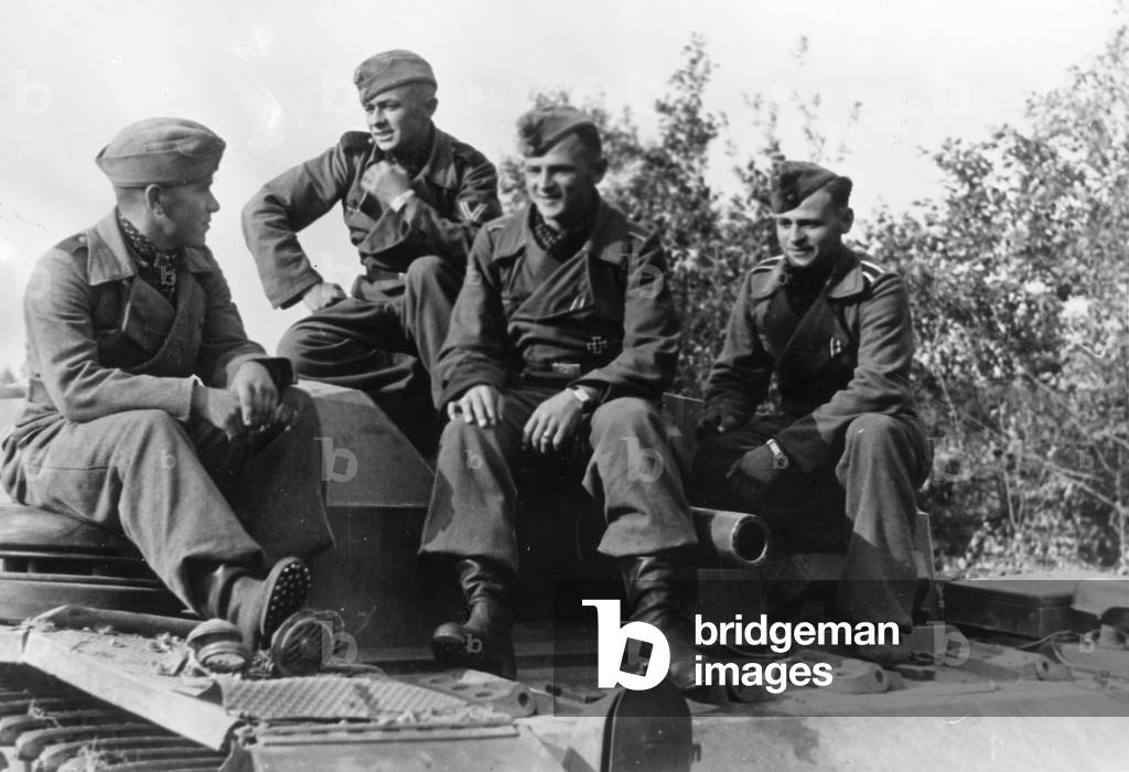 German assault gun crew on their tank, 1941 (b/w photo)