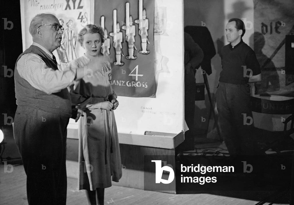 Carl Froelich and Sabine Peters on the set of 'The Four Companions', 1938 (b/w photo)