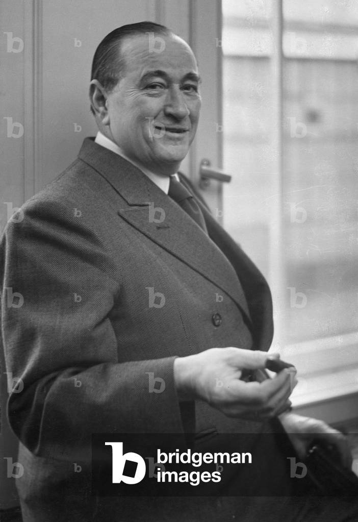 German engineer and car designer Carl Friedrich Wilhelm Borgward smiling and holding a cigar, 1952 (photo)