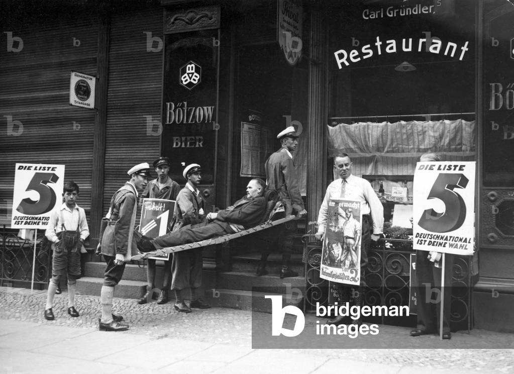 Patient is being carried to vote, 1932