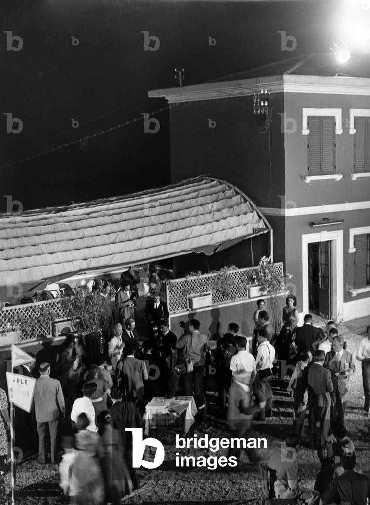 Opening reception for the shooting of 'The Monte Carlo Story' in Rome, 1957 (b/w photo)