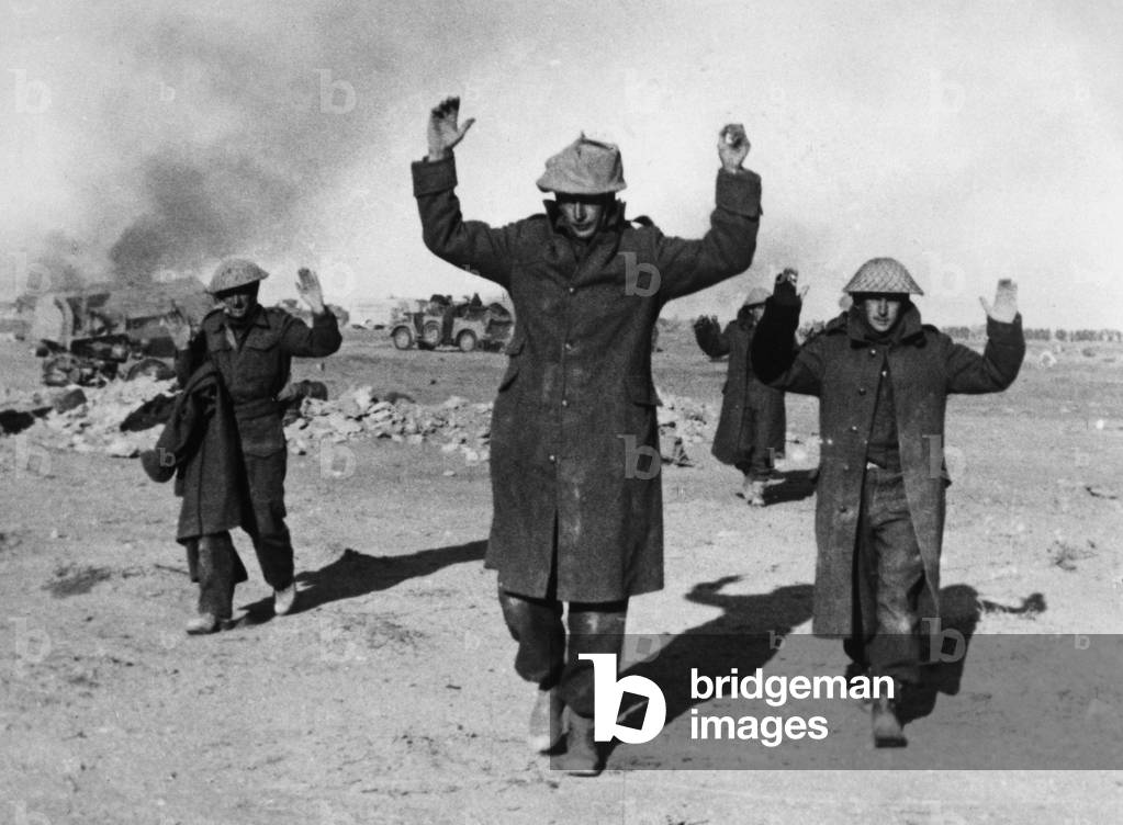 Surrendering soldiers during the First German offensive on Tobruk, Libya, 1941 (b/w photo)