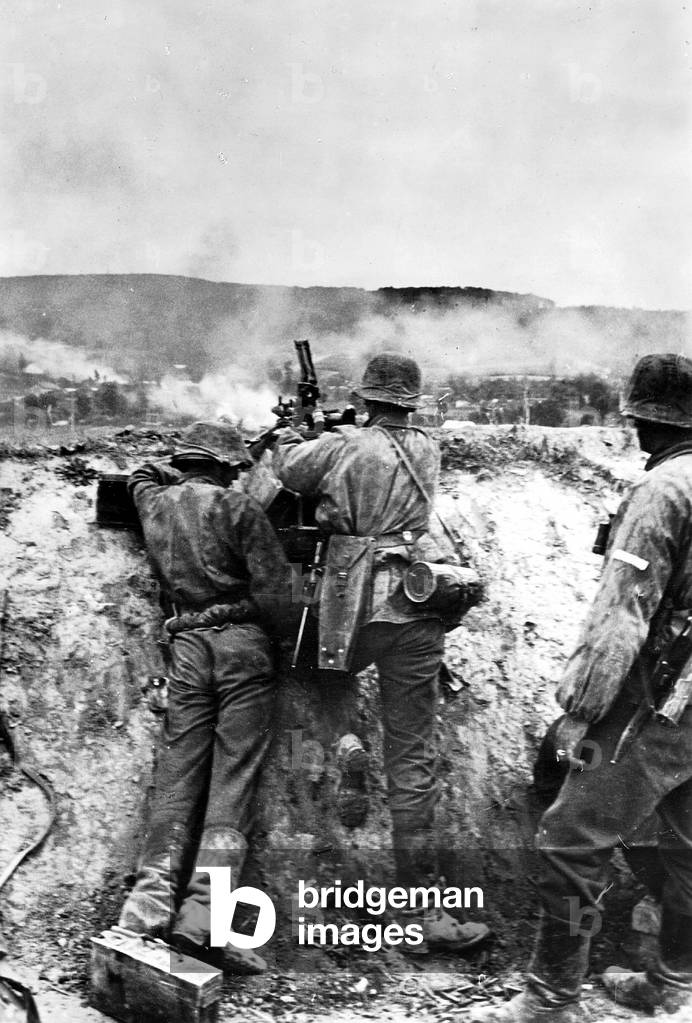 Waffen-SS at the machine gun, 1941 (b/w photo)