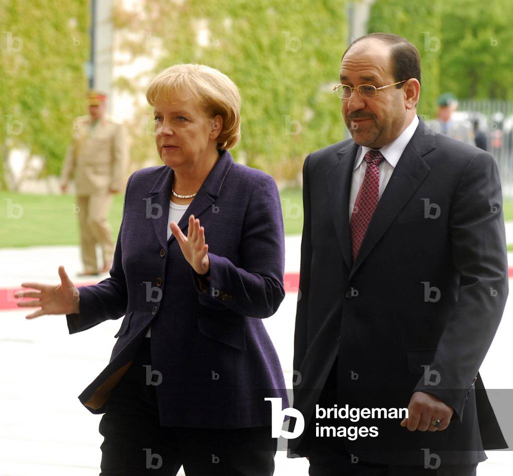 German Chancellor Angela Merkel receives the Iraqi Prime Minister Nouri al-Maliki with military honours in Berlin, 2008 (photo)