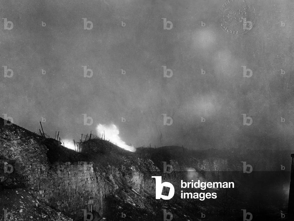 Shrapnel clouds over a fortified position during the First World War (b/w photo)