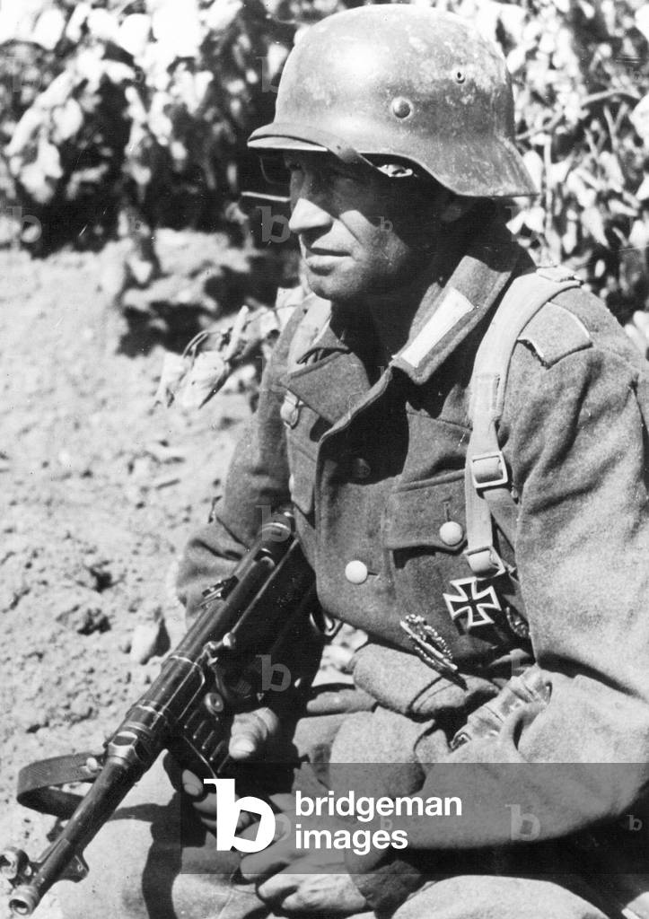 German Soldier During the Latvia Campaign, 1944 (b/w photo)