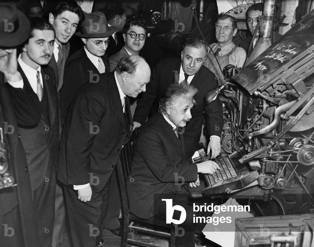 Albert Einstein on a typesetting machine in the building of the 'Jewish Bulletin’, New York, 1934 (b/w photo)