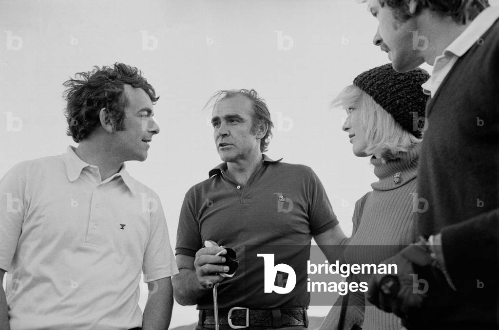 Sean Connery on a golf course with Tony Jacklin, Spain, 1972 (b/w photo)
