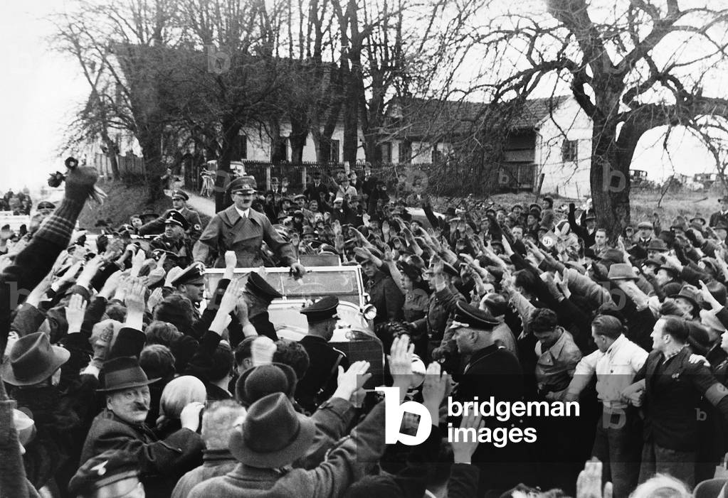 Adolf Hitler while driving through Austria, 1938 (b/w photo)