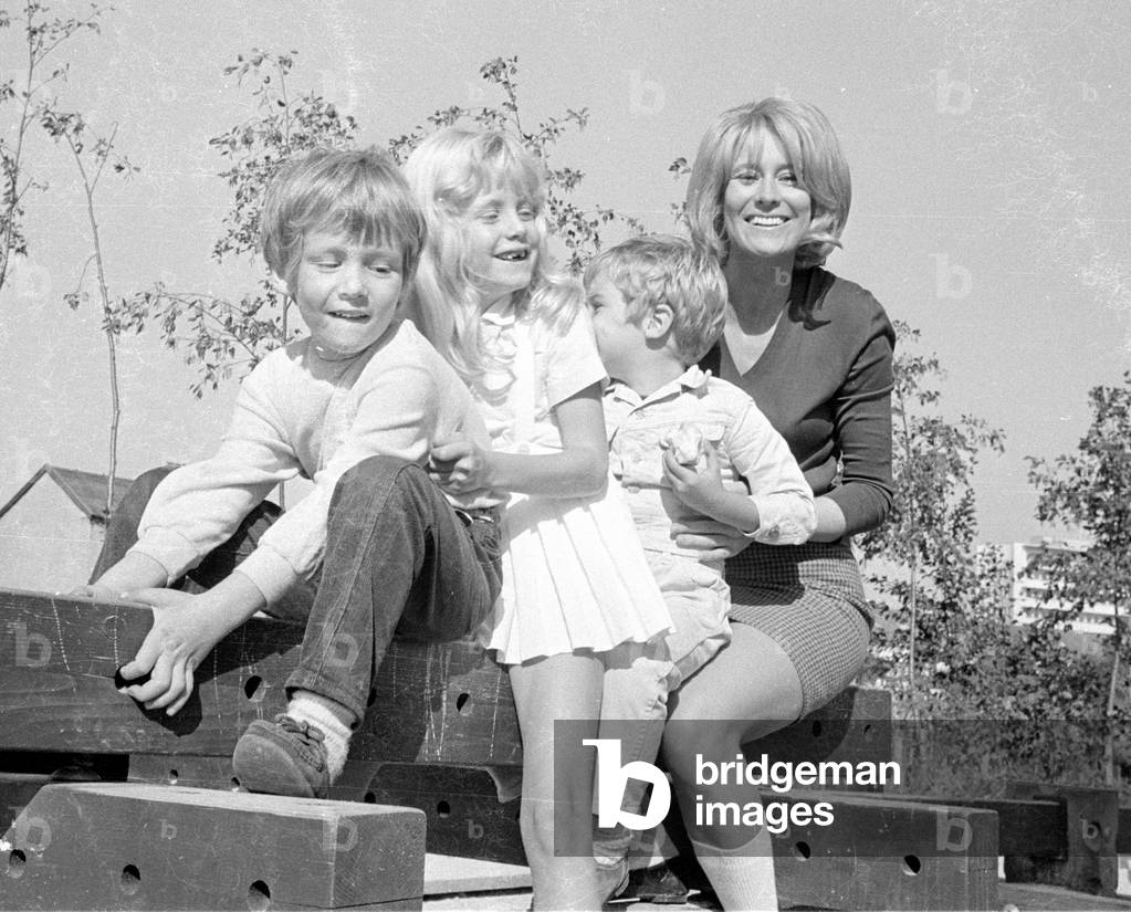 Tommi Ohrner with his siblings and his mother, 1969 (b/w photo)