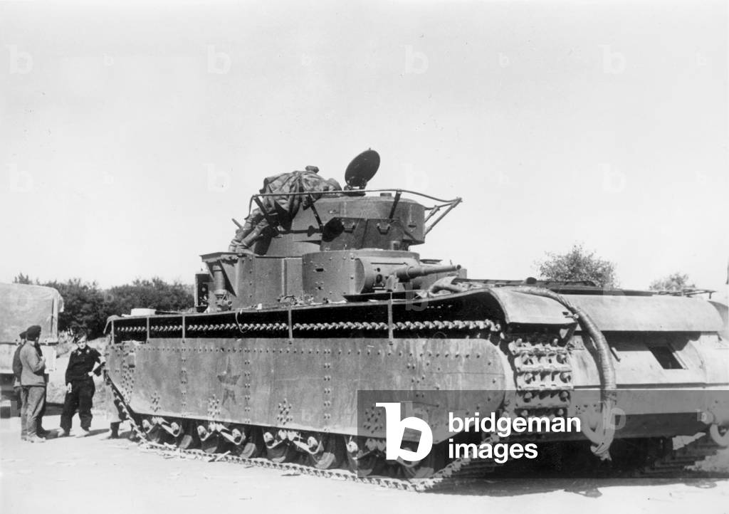 Destroyed Russian tank on the Eastern front, 1941 (b/w photo)