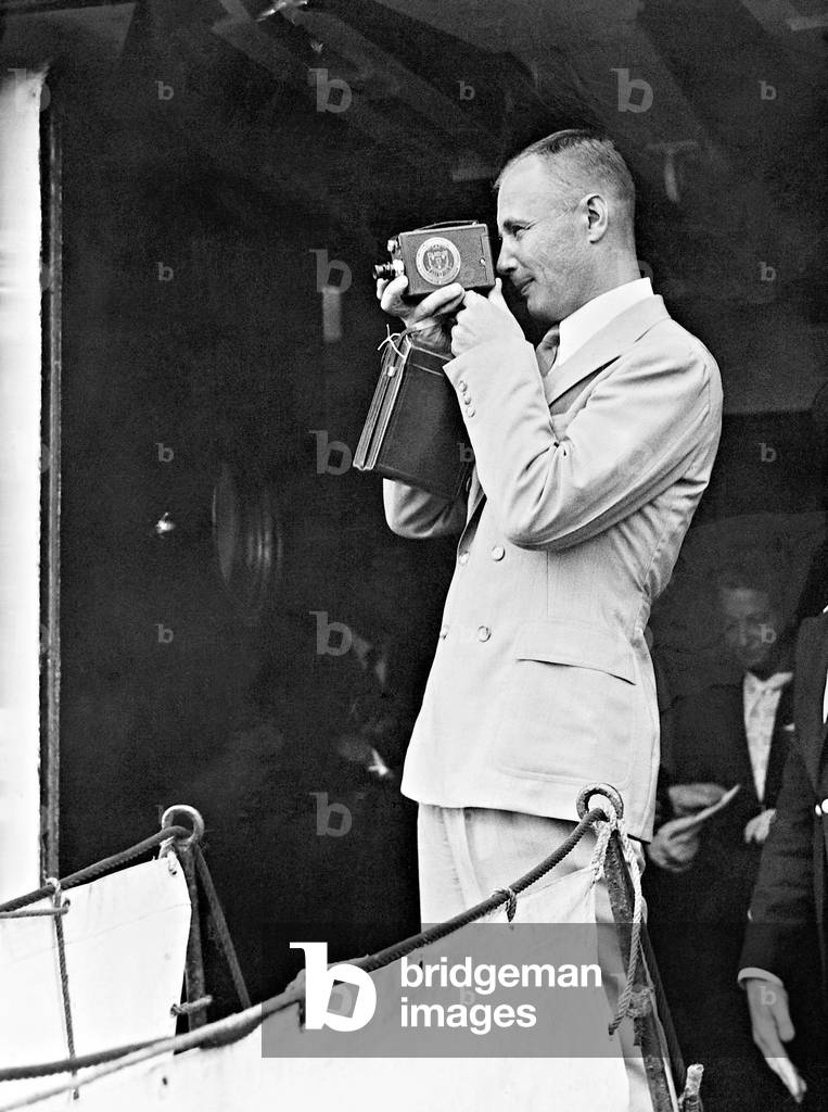 Alexander Beliakov photographs at his arrival in Southampton, 1937 (b/w photo)