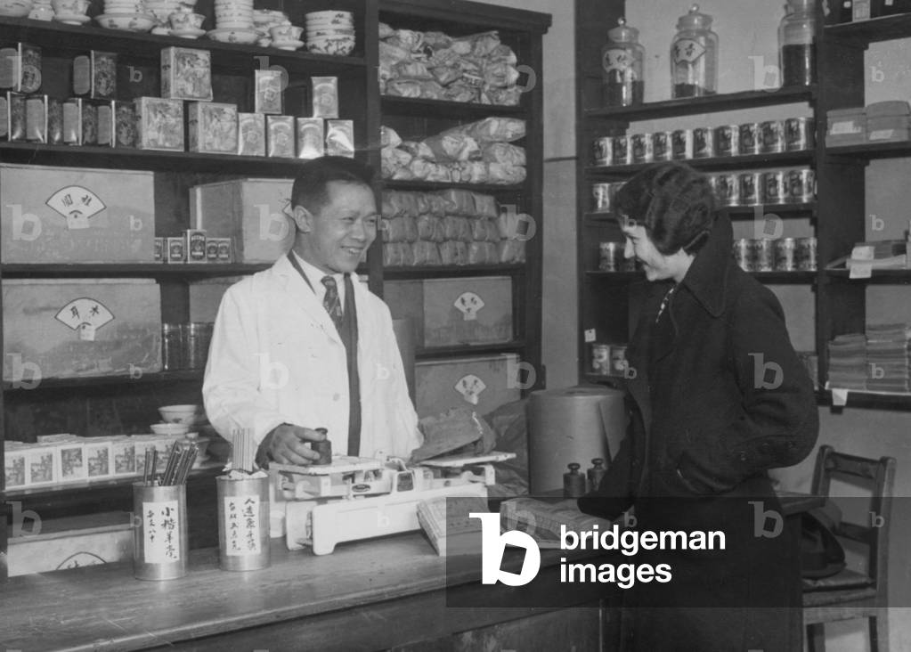 Chinese merchant in Berlin, 1934 (b/w photo)