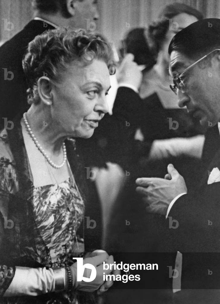 Erica Pappritz having a conversation (b/w photo)