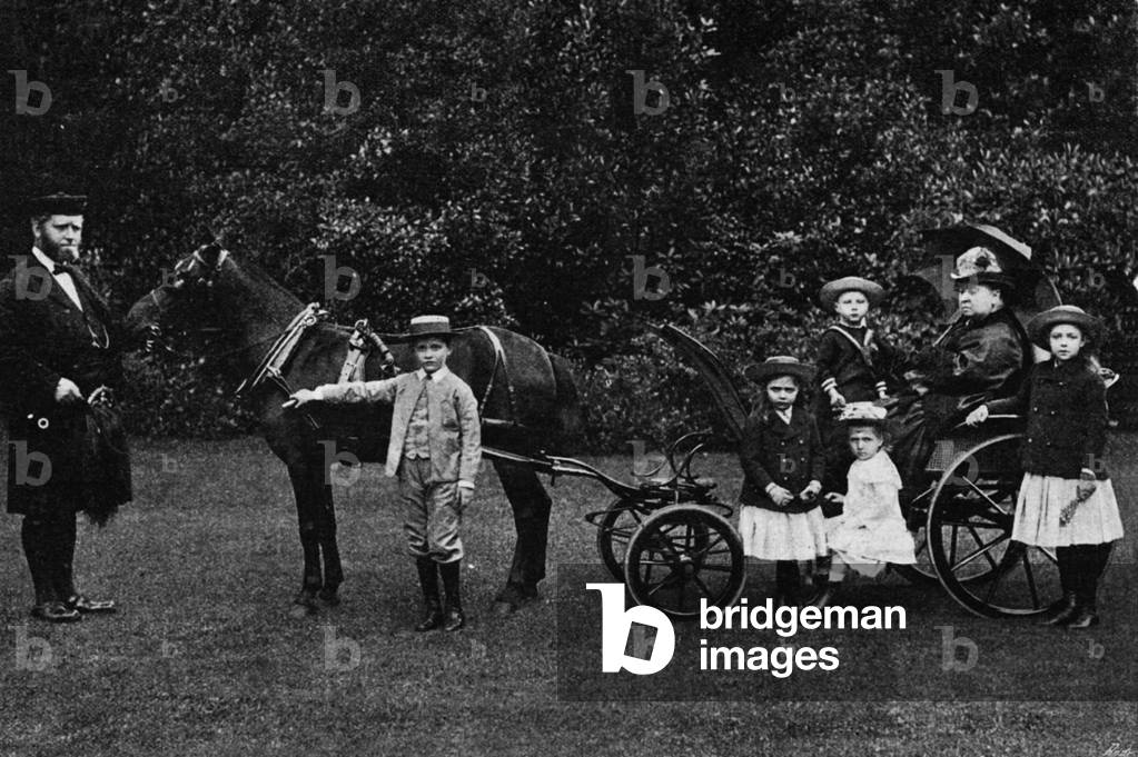 Queen Victoria of Great Britain in the middle of grandchildren (b/w photo)