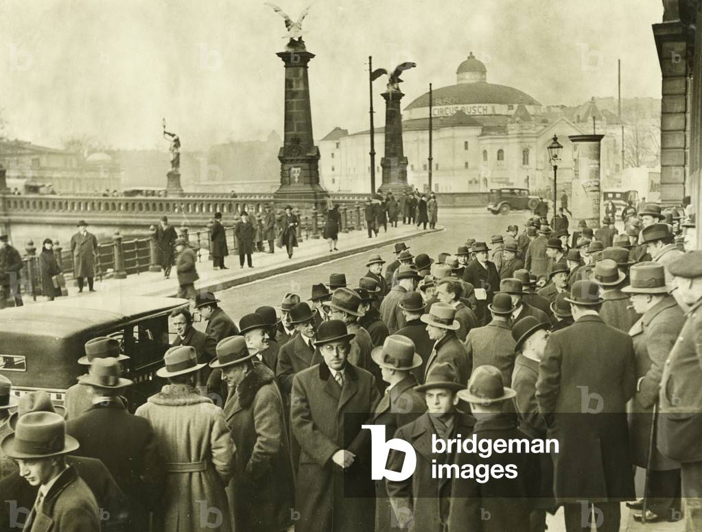 Concerned businessmen wait before the Berlin stock exchange which was closed on instruction of the government between 18 September 1931 and 25 February 1932, Berlin 1931-32 (b/w photo)