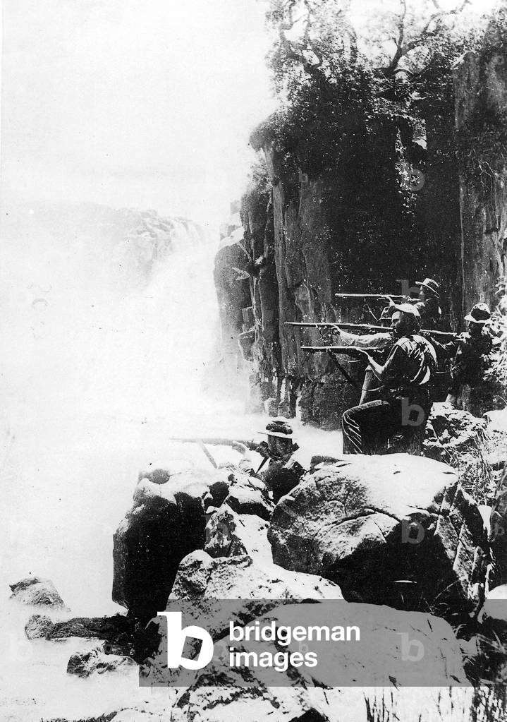Boers in combat with British troops, 1899 (b/w photo)