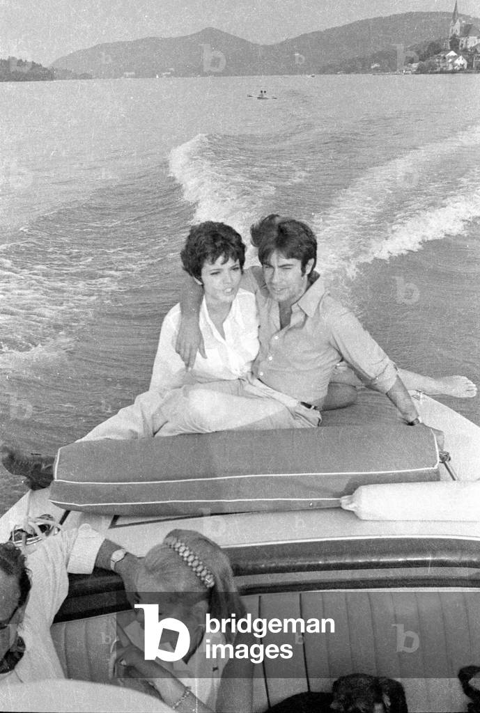 Uschi Glas and Roy Black on a motor boat, 1969 (b/w photo)