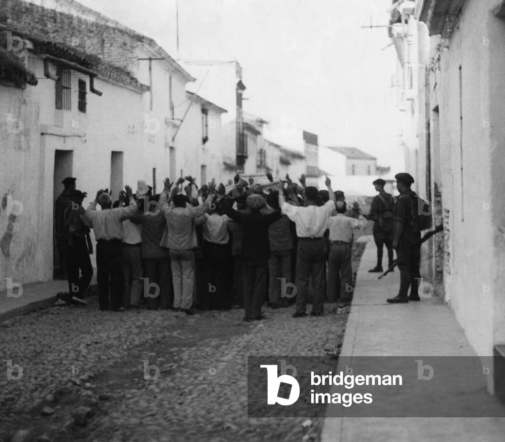 Republican fighters surrender to Spanish national soldiers, Seville, 1936