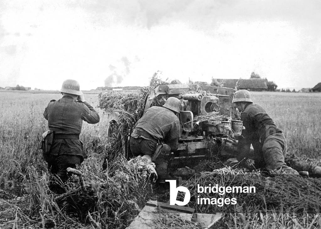 German Pak in combat against Russian tank (b/w photo)